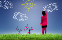 Little girl painting the sky - Child joy and happiness concept